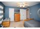 A bedroom featuring neutral walls, two twin beds, and plenty of storage at 1030 E Lakehaven Way, Mcdonough, GA 30253