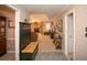 Foyer view leading into living area; features coat rack and decorative furnishings at 1030 E Lakehaven Way, Mcdonough, GA 30253