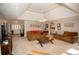 Spacious living room filled with natural light, comfortable seating and a stylish coffee table at 1030 E Lakehaven Way, Mcdonough, GA 30253