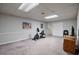 Finished basement area with carpet and neutral paint; perfect for recreation at 4423 Windsor Oaks Cir, Marietta, GA 30066