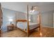Bright main bedroom with wood floors, ceiling fan, and ample space at 4423 Windsor Oaks Cir, Marietta, GA 30066