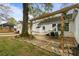 Backyard featuring a hammock under a pergola and outdoor dining at 502 Allgood Ne Rd, Marietta, GA 30060