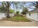 Spacious backyard with a patio, lawn, mature trees, and outdoor seating at 502 Allgood Ne Rd, Marietta, GA 30060