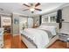 Bedroom with hardwood floors, an ensuite bathroom, and a closet at 502 Allgood Ne Rd, Marietta, GA 30060