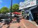 Three Roses Tavern located on the Marietta Square with tables and chairs outside at 502 Allgood Ne Rd, Marietta, GA 30060