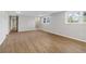 Large basement area with wood-look floors, neutral walls and recessed lighting at 6684 Birch Rd, Winston, GA 30187