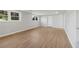 Basement area featuring wood-look floors, neutral walls and natural light at 6684 Birch Rd, Winston, GA 30187