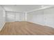Finished basement featuring wood-look floors and neutral paint, offering versatile space at 6684 Birch Rd, Winston, GA 30187