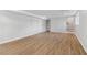 Finished basement with wood-look floors, neutral walls and recessed lighting at 6684 Birch Rd, Winston, GA 30187