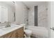 Updated bathroom with marble-look tile and modern vanity at 6684 Birch Rd, Winston, GA 30187