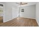 Cozy bedroom with wood-look floors and a window providing natural light at 6684 Birch Rd, Winston, GA 30187