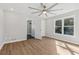 Bedroom featuring wood floors, a ceiling fan, neutral paint and natural light at 6684 Birch Rd, Winston, GA 30187