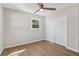 A comfortable bedroom features wood-look floors and a double door closet at 6684 Birch Rd, Winston, GA 30187