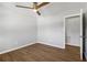 A bedroom featuring a ceiling fan and wood-look floors at 6684 Birch Rd, Winston, GA 30187