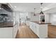 Spacious kitchen featuring an island, stainless appliances, and stylish backsplash at 6684 Birch Rd, Winston, GA 30187