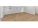Inviting living space featuring hardwood floors, natural light, and a contemporary design at 6684 Birch Rd, Winston, GA 30187