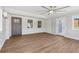 Spacious living room featuring hardwood floors and a modern ceiling fan at 6684 Birch Rd, Winston, GA 30187