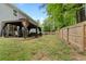 Spacious backyard with patio and fire pit, perfect for outdoor activities and relaxation at 100 Karla Ct, Roswell, GA 30076