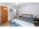 Comfortable bedroom features hardwood floors, neutral tones, and ample natural light at 100 Karla Ct, Roswell, GA 30076