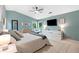 Bright main bedroom featuring sleek white furniture, large windows, and a relaxing atmosphere at 100 Karla Ct, Roswell, GA 30076