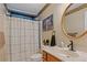 Cozy bathroom featuring a wood vanity, white marble countertop, and decorative accents at 327 Stone Valley Xing, Canton, GA 30114