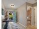 Bright foyer features an open front door to the landscaped front yard and a hall to the Primary at 327 Stone Valley Xing, Canton, GA 30114