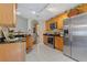 Traditional kitchen features granite countertops, stainless steel appliances, and ample cabinet space at 327 Stone Valley Xing, Canton, GA 30114