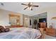Spacious main bedroom features a vaulted ceiling, ceiling fan and an ensuite bathroom access at 327 Stone Valley Xing, Canton, GA 30114