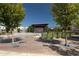 Community amphitheater with a stage, green space, and fountain, framed by trees and seating areas for gatherings at 3806 Jack Vernon Cir, Powder Springs, GA 30127