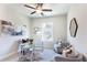 Home office with modern desk, comfortable seating, and neutral decor at 3806 Jack Vernon Cir, Powder Springs, GA 30127