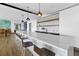 Modern bar area with marble countertops, stylish pendants and comfortable seating at 923 Peachtree Ne St # 1625, Atlanta, GA 30309