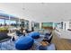 Well appointed clubhouse with comfortable seating, a bar area, and access to outdoor amenities at 923 Peachtree Ne St # 1625, Atlanta, GA 30309