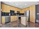 Well-lit kitchen with stainless steel appliances, ample cabinet space, and a black tiled backsplash at 923 Peachtree Ne St # 1625, Atlanta, GA 30309