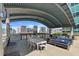 Stylish outdoor kitchen with built in stainless steel grill, tables and city views at 923 Peachtree Ne St # 1625, Atlanta, GA 30309