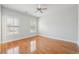 Spacious bedroom with wood floors and shutters at 10686 Austen Bnd, Alpharetta, GA 30022