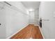 Walk-in closet with wood floor and wire shelving at 10686 Austen Bnd, Alpharetta, GA 30022