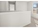 Upstairs hallway with views of the outside at 8234 Coldstream Dr, Fairburn, GA 30213