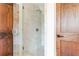 Elegant bathroom with a glass shower and dark wood trim at 1585 S Ponce De Leon Ne Ave # 20, Atlanta, GA 30307