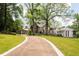 Stately home with lush landscaping and a long driveway at 1585 S Ponce De Leon Ne Ave # 20, Atlanta, GA 30307