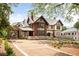 Stunning Tudor-style home featuring brick and stucco, a spacious driveway, and meticulously landscaped grounds at 1585 S Ponce De Leon Ne Ave # 20, Atlanta, GA 30307