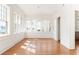 Bright living room featuring hardwood floors, a view of the outdoors, and white walls at 1585 S Ponce De Leon Ne Ave # 20, Atlanta, GA 30307