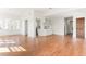 Bright living area with hardwood floors leading to dining area and butler's pantry with cabinetry at 1585 S Ponce De Leon Ne Ave # 20, Atlanta, GA 30307