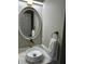 Elegant bathroom featuring a vessel sink, gold fixtures, marble countertops and an ornate mirror at 2657 Mcguire Nw Dr, Kennesaw, GA 30144