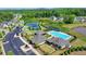 Aerial view of community amenities including a pool, tennis courts, and clubhouse at 3460 Montebello Pkwy, Cumming, GA 30028