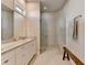 Elegant bathroom featuring a glass shower, granite countertop, and bright lighting at 3460 Montebello Pkwy, Cumming, GA 30028