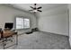 Versatile bonus room with neutral carpet, vaulted ceilings, and lots of space at 3460 Montebello Pkwy, Cumming, GA 30028