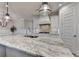 Spacious kitchen featuring granite countertops, stainless steel appliances, and custom cabinetry at 3460 Montebello Pkwy, Cumming, GA 30028