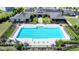 Resort-style swimming pool with ample seating, a clubhouse, and manicured landscaping for community enjoyment at 3460 Montebello Pkwy, Cumming, GA 30028