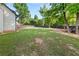 Expansive backyard offering ample space for recreation and relaxation at 990 Lilac Arbor Rd, Dacula, GA 30019