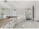 Bathroom with a separate tub and glass-enclosed shower at 990 Lilac Arbor Rd, Dacula, GA 30019